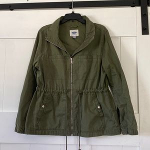 Army green utility jacket with adjustable waist draw string.